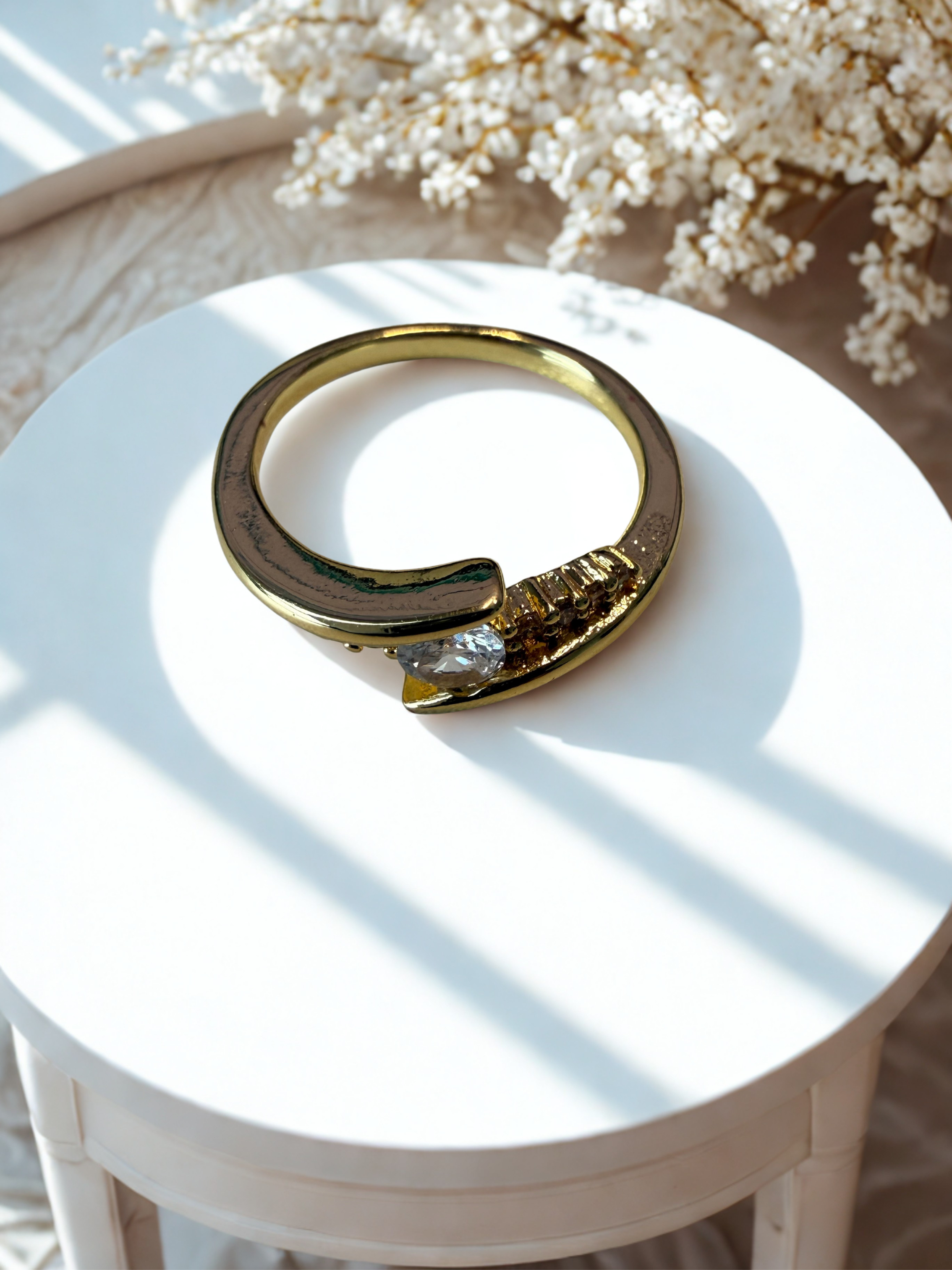 Bypass Solitaire Ring – 18K Gold Plated Round Cut Ring with Micro-Set CZ Pavé