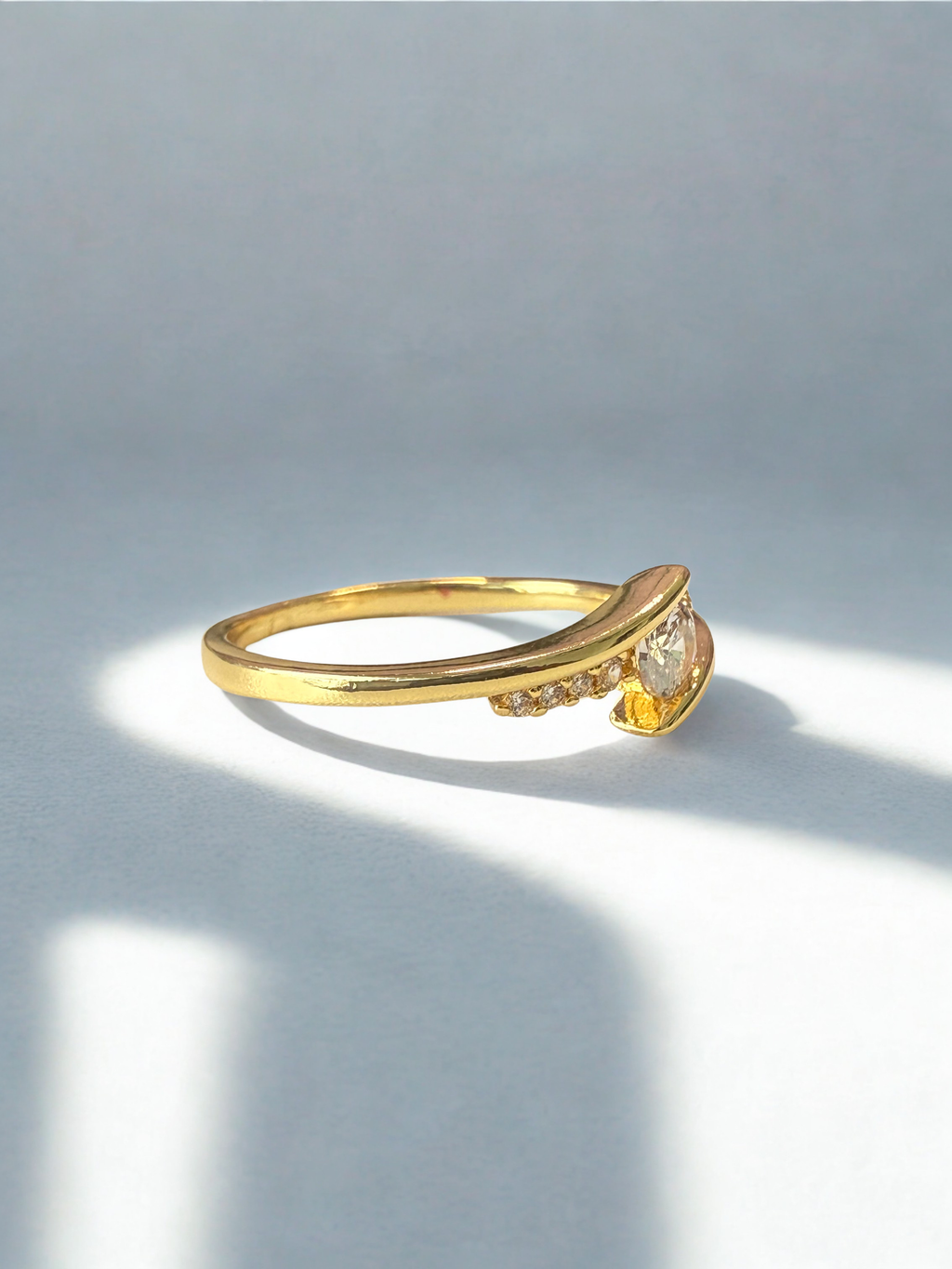 Bypass Solitaire Ring – 18K Gold Plated Round Cut Ring with Micro-Set Pavé cubic zircon