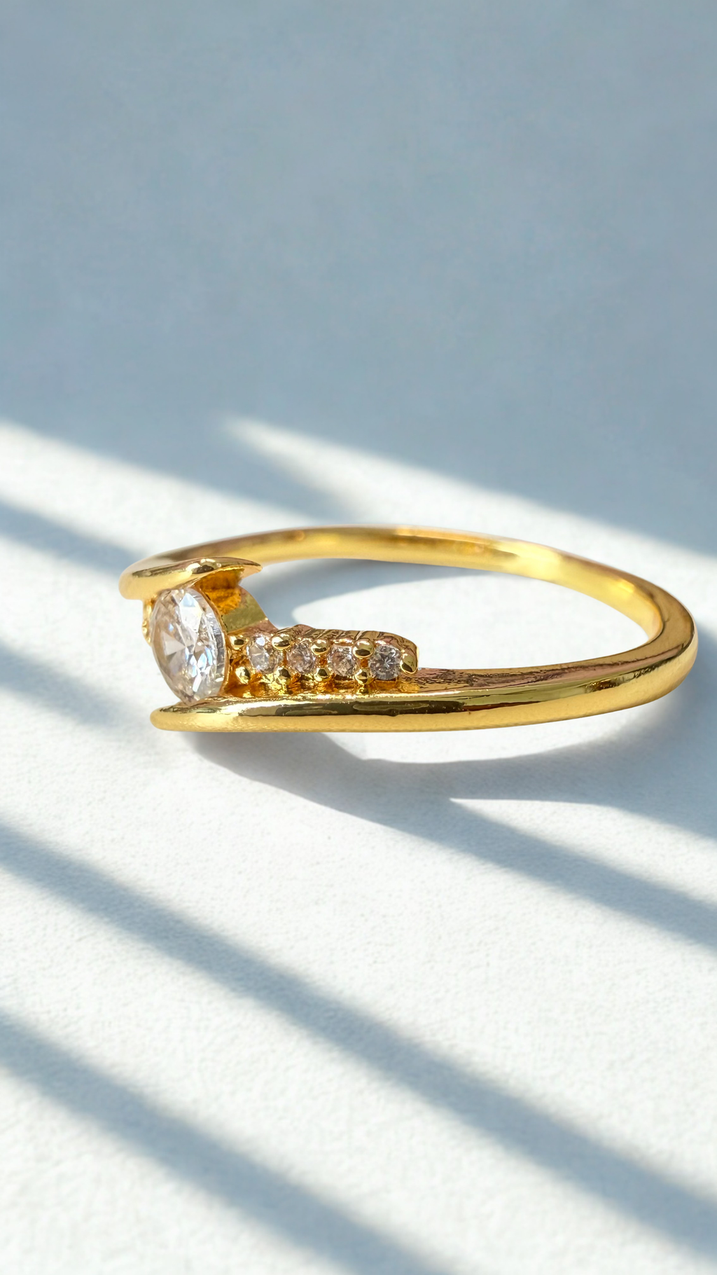 Bypass Solitaire Ring – 18K Gold Plated Round Cut Ring with Micro-Set Pavé cubic zircon