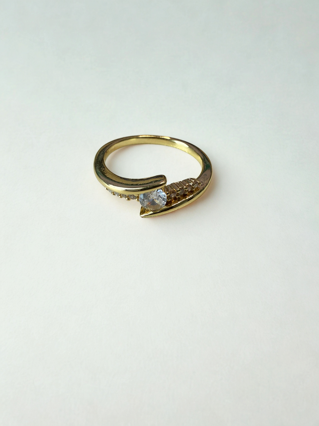 Bypass Solitaire Ring – 18K Gold Plated Round Cut Ring with Micro-Set CZ Pavé